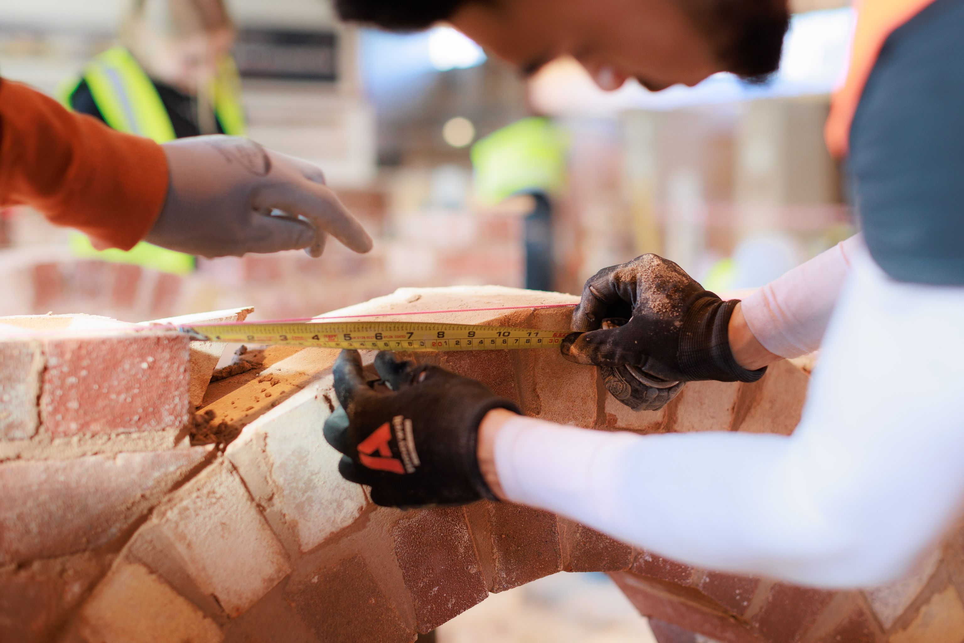 Black student in bricklaying workshop