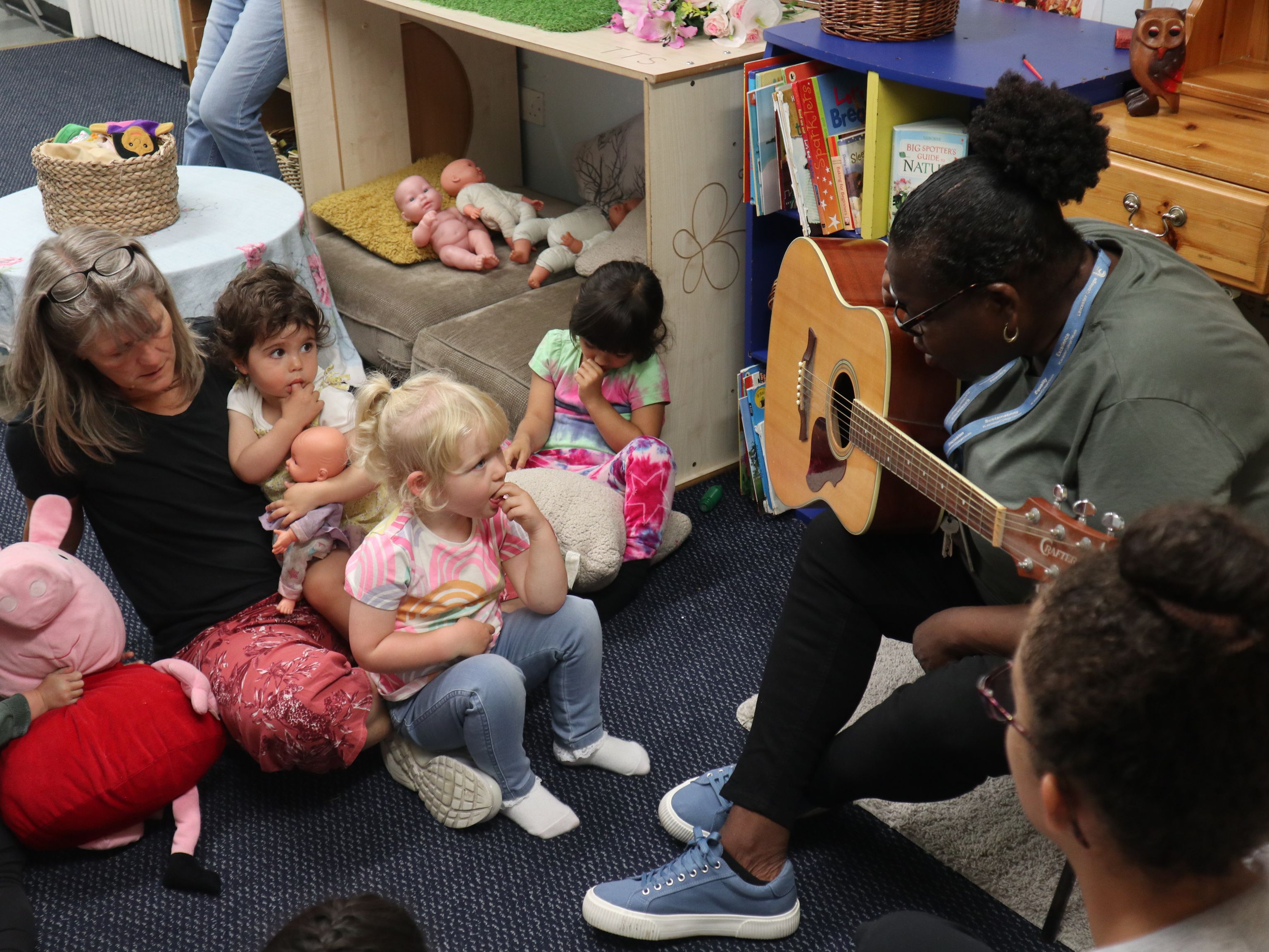 staff and nursery children